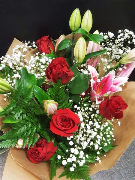 Margaret Raymond Florist Pink Lillies and Red Roses with Gyp
