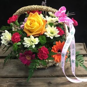 Margaret Raymond Florist vibrant wicker basket
